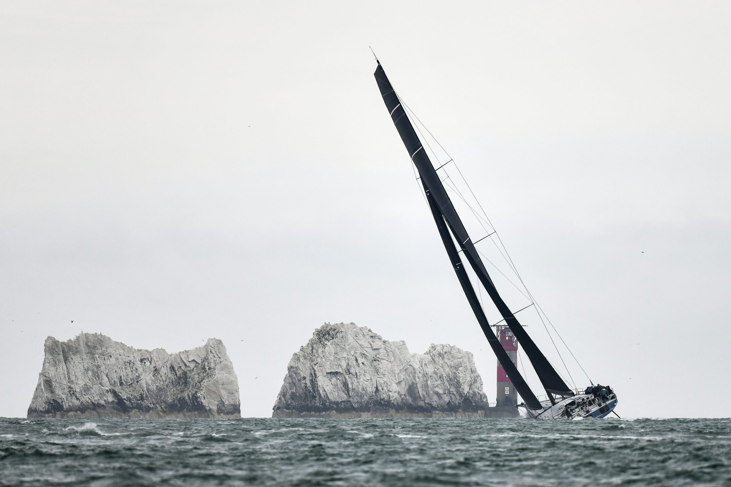 Yacht racing past the Needles, Isle of Wight