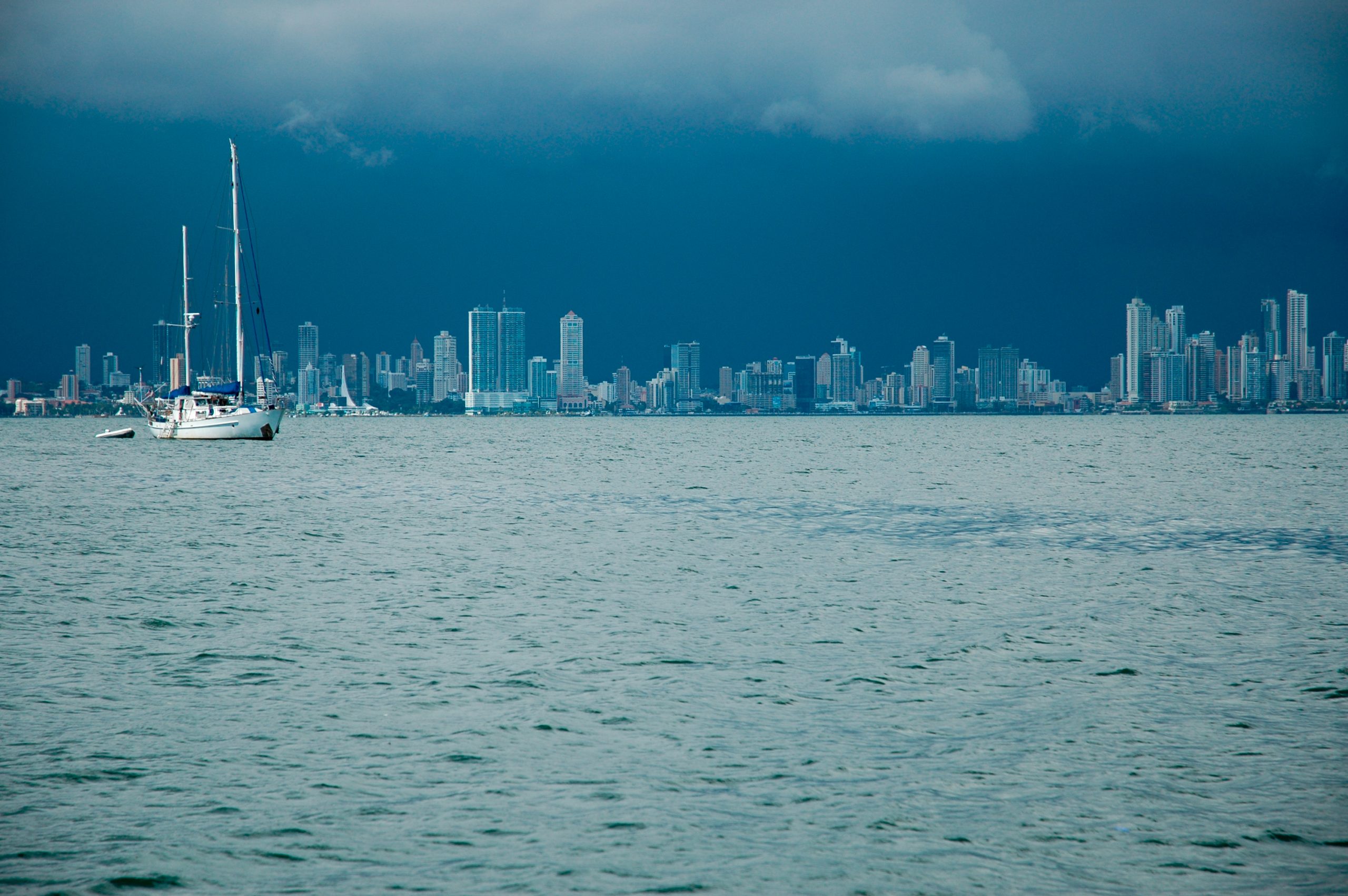 Sailboat on the Bay of Panama with the Panama City skyline